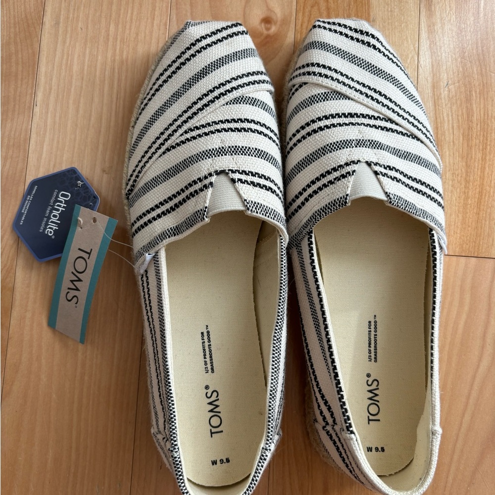 Never worn original Toms